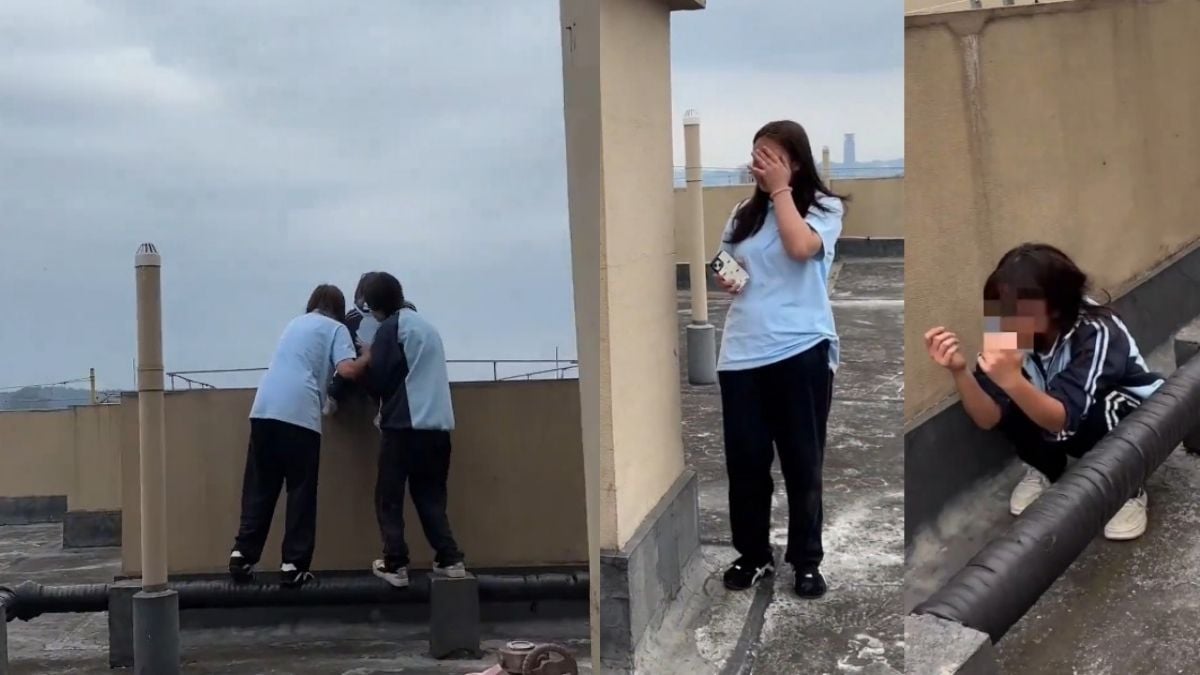 Video shows shocking alleged bullying as Chinese students reportedly push classmate towards rooftop ledge in Guizhou